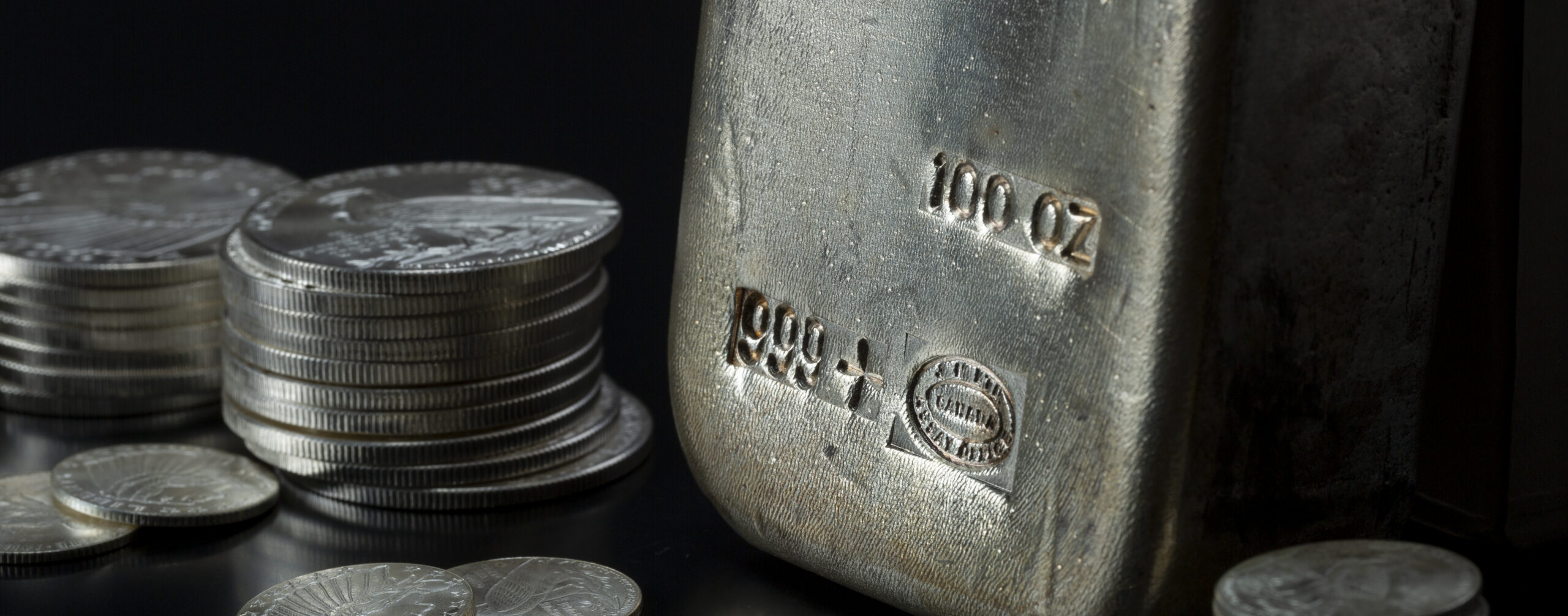 Variety of silver ingots and coins